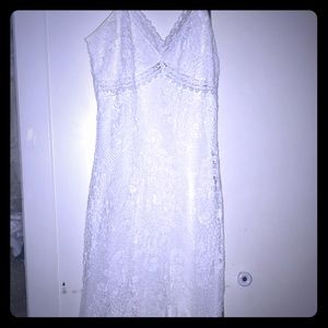 I’m selling a white lace dress